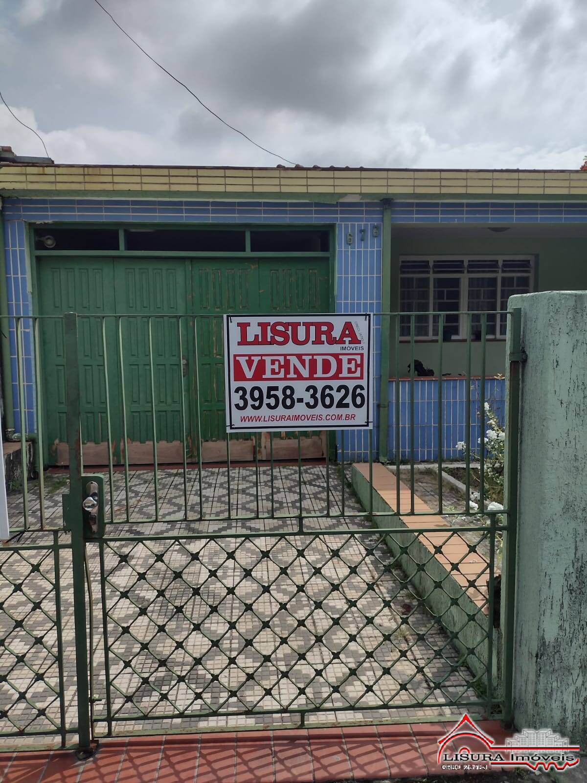 CASA COM TERRENO DE 1.487M² JD ESPERANÇA JACAREI SP